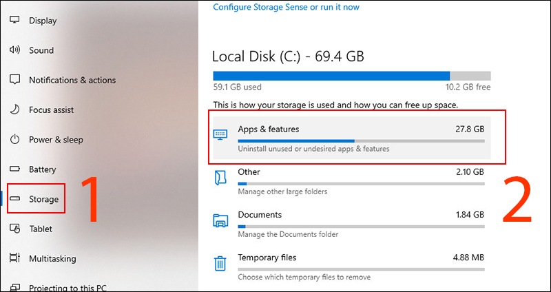 Chọn Apps & features ở tab Storage